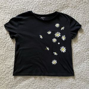 black shirt with flowers